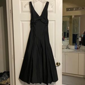 Black cocktail dress with crinoline by CACHE.